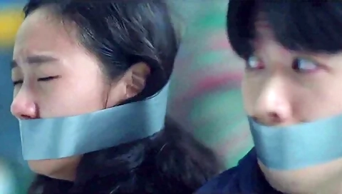 Korean Woman And Man Wraparound Tape Gagged